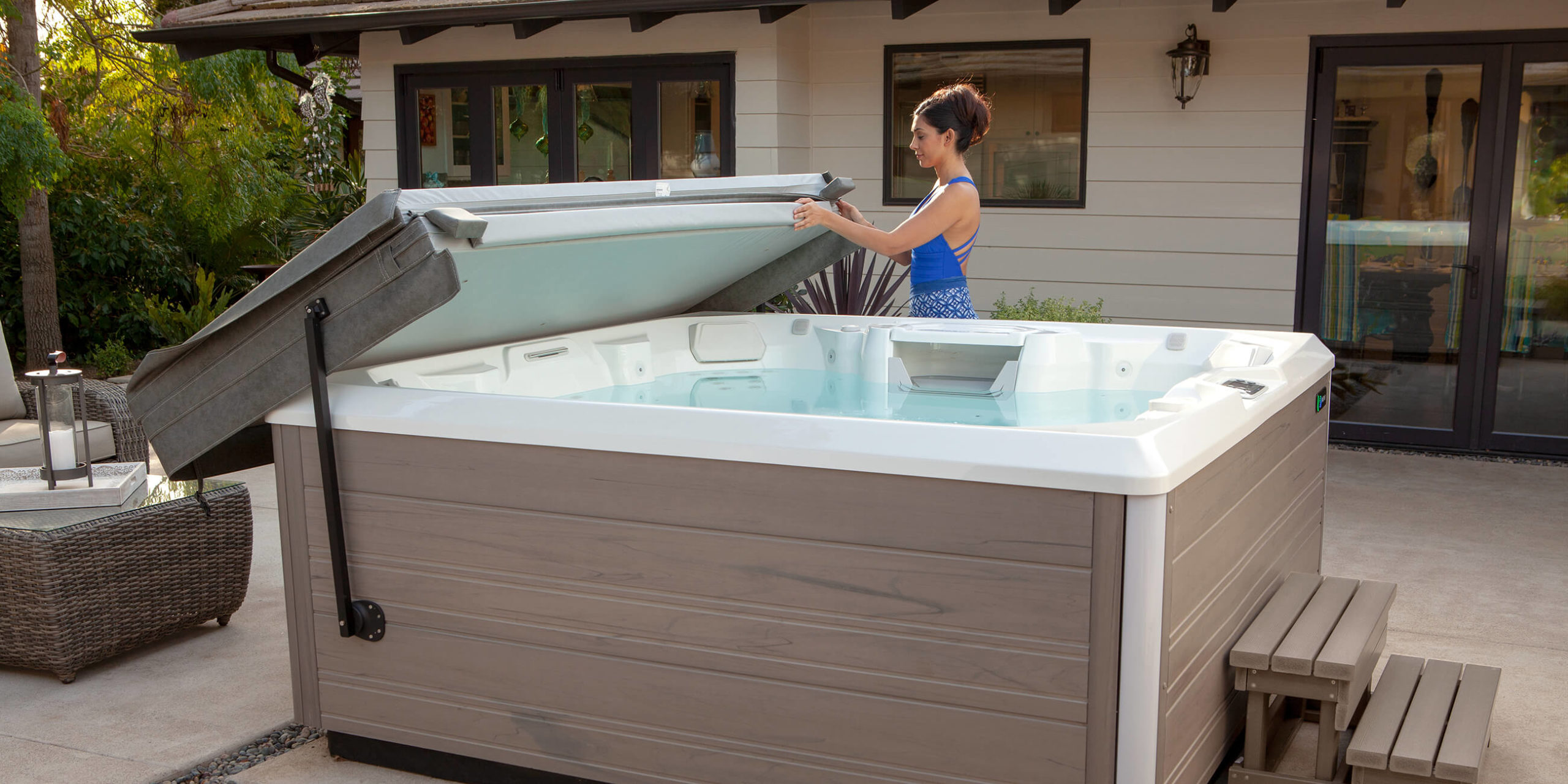 hot-spring-spas-limelight-collection-page-cspot-lifestyle-cover-lifter-woman-1-scaled